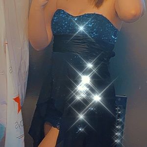 blue form fitting, dress.